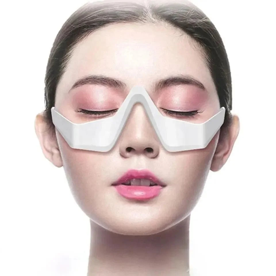 Woman wearing EyeLume™ Red Light Eye Massager glasses