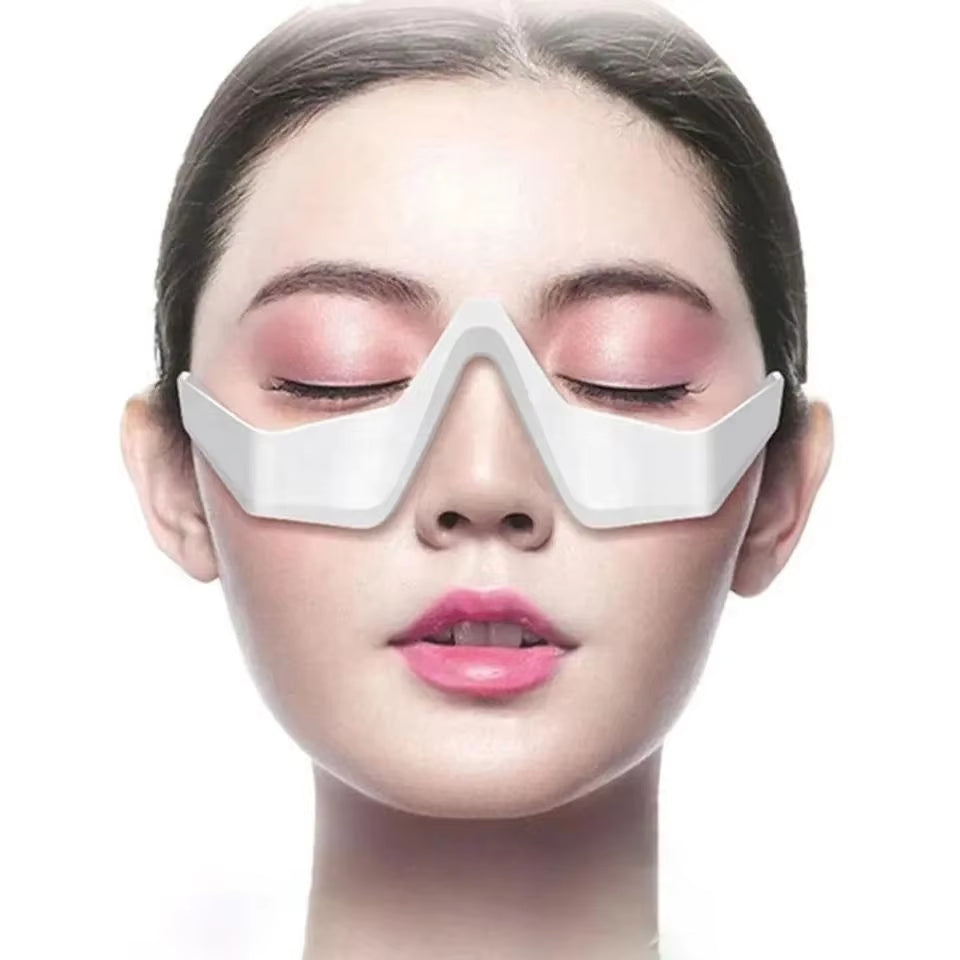 Woman wearing EyeLume™ Red Light Eye Massager glasses 06