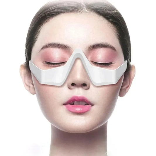 Woman wearing EyeLume™ Red Light Eye Massager glasses